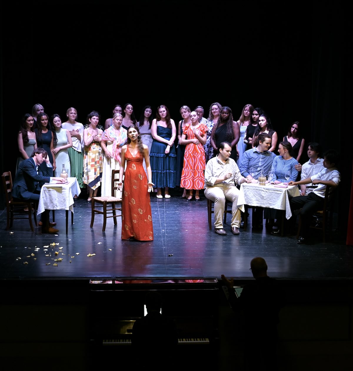 Group of people standing on stage
